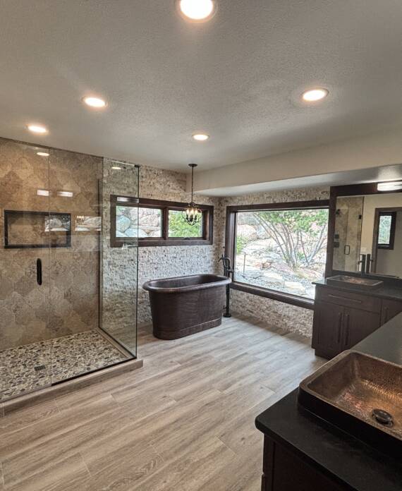 Primary bathroom remodel with copper fixtures in Colorado Springs