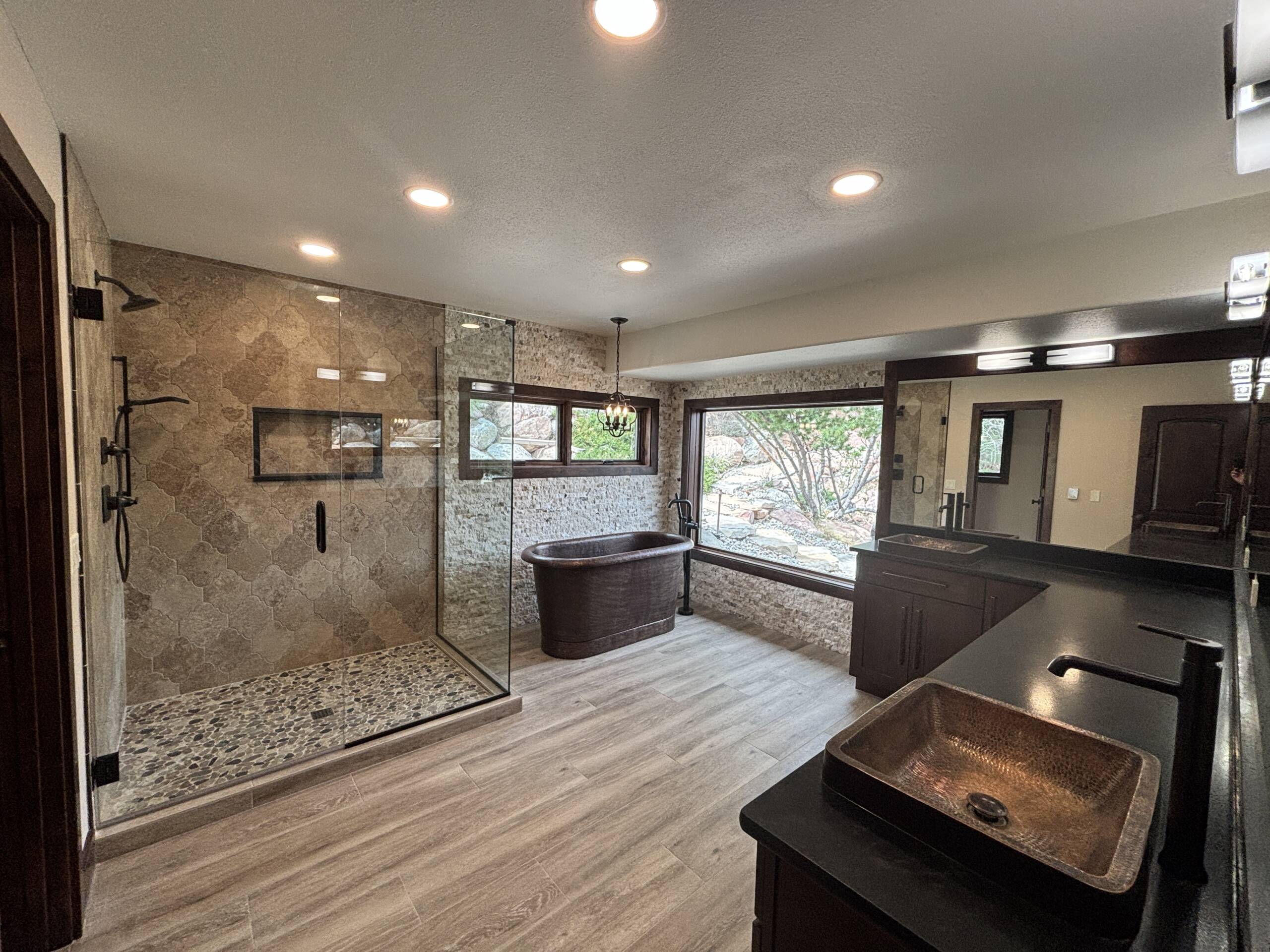 Primary bathroom remodel with copper fixtures in Colorado Springs